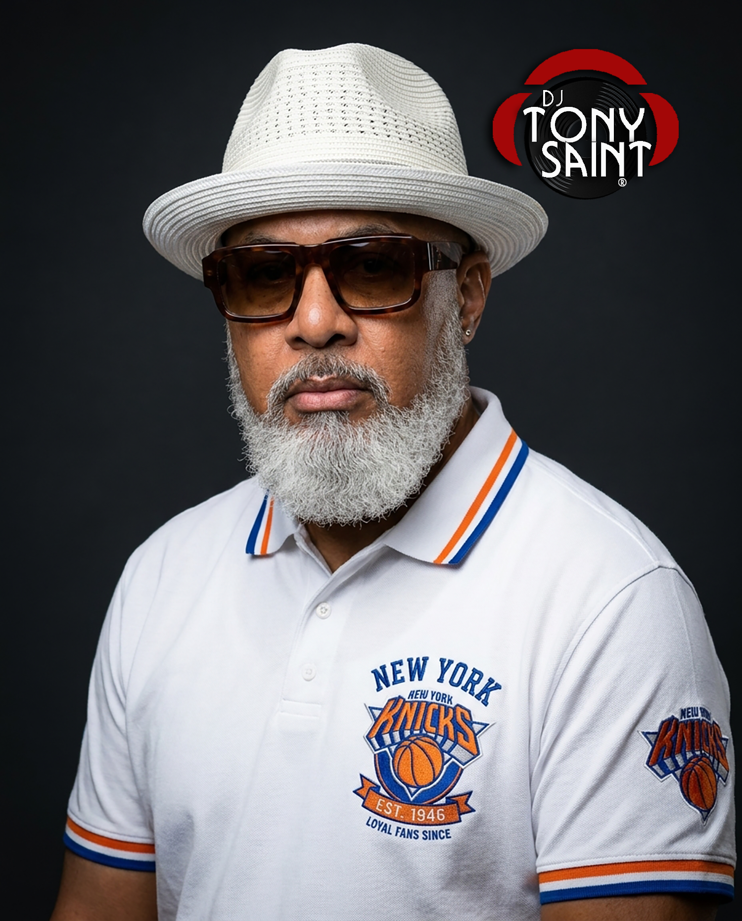 DJ Tony Saint in a New York Knicks polo celebrating the Knicks' 2026 NBA Championship